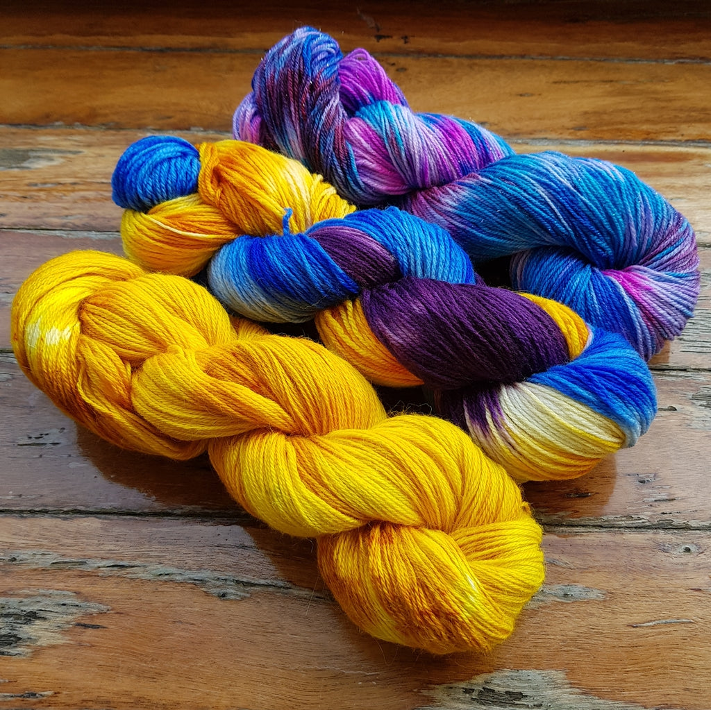 Yarn Kit | Fingering & Sock Yarn Kit |  3 Hanks Yellow, Purple, Blue Cali Sunshine, Three Skein Fade, Sock Weight Yarn Designers Boutique