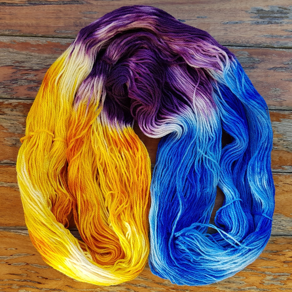 Hand Painted Sock Yarn, Merino & Nylon, Gold, Purple, & Blue Yarn Caribbean Party Hand-Painted Sock Yarn, Purple, Gold, Sky Blue Yarn Designers Boutique