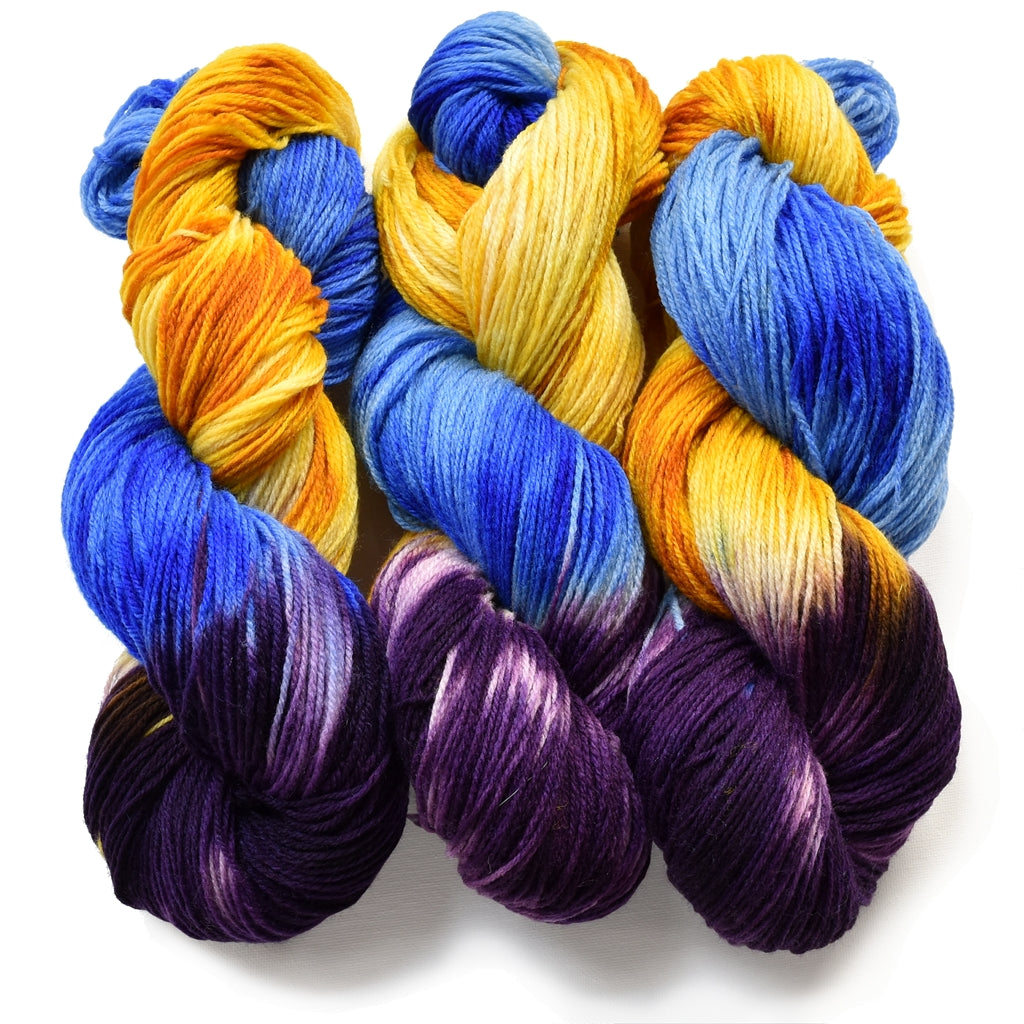 Hand Painted Sock Yarn, Merino & Nylon, Gold, Purple, & Blue Yarn Caribbean Party Hand-Painted Sock Yarn, Purple, Gold, Sky Blue Yarn Designers Boutique