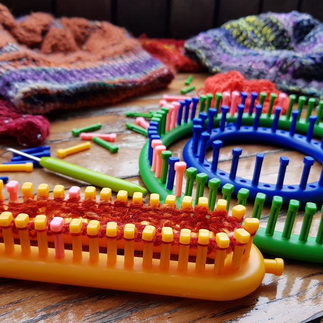 knitting looms with adjustable gauges