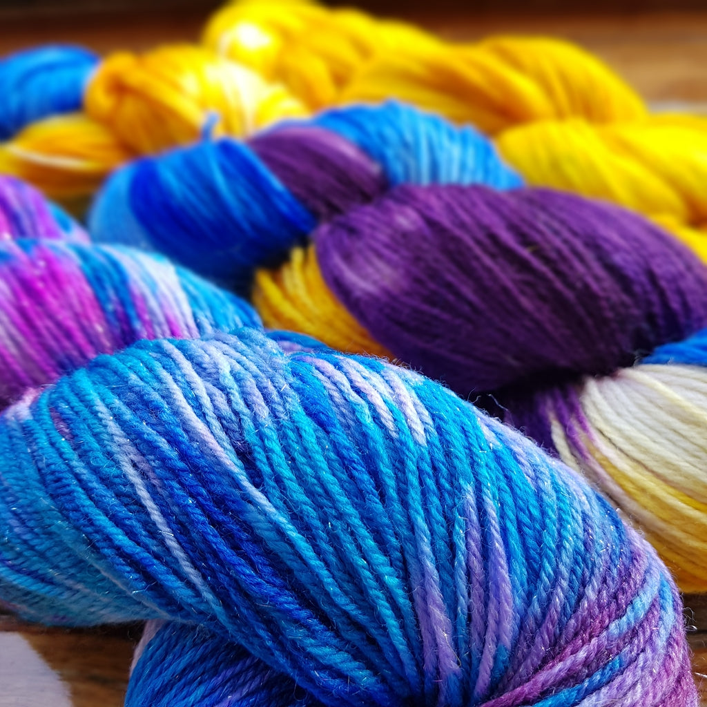 Yarn Kit | Fingering & Sock Yarn Kit |  3 Hanks Yellow, Purple, Blue Cali Sunshine, Three Skein Fade, Sock Weight Yarn Designers Boutique